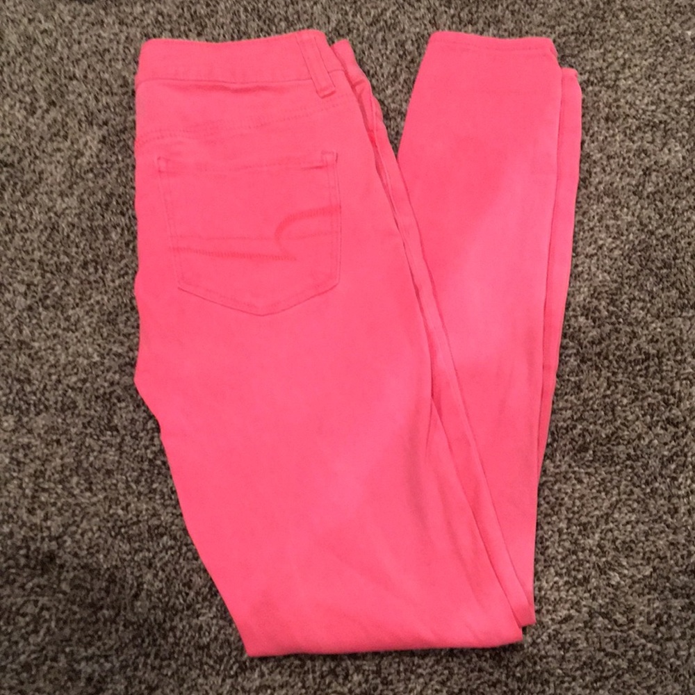 Neon pink American Eagle skinny jeans